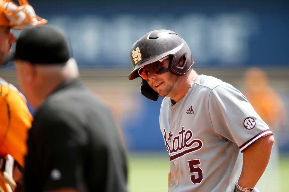 Mississippi State's Tanner Allen (5) takes an extra few minutes to recover after fouling a ball off his foot on Thursday. MSU went on to lose 12-2 to Tennessee as the Bulldogs were eliminated from the SEC Baseball Tournament.  (Photo by Gary Cosby Jr.)